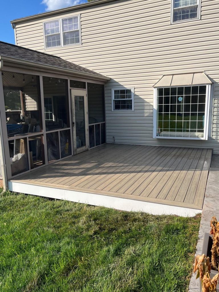 Screened-in porch and attached composite deck built by Cedar Creek Construction in the Lehigh Valley, PA